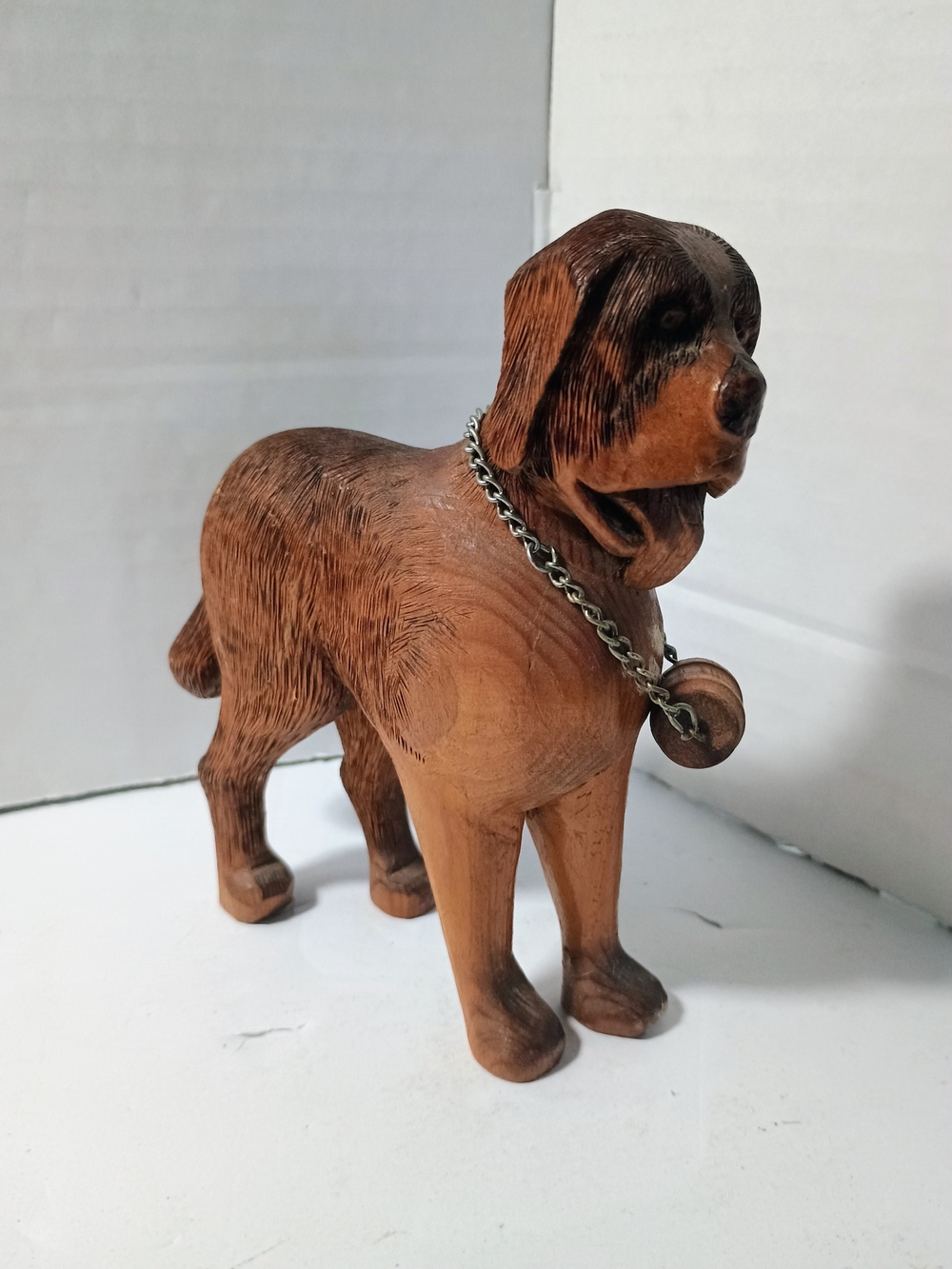 Classic Brown Wooden Dog Figurine with Metal Chain Collar